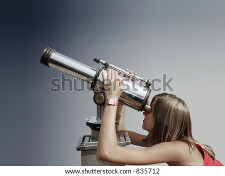 Blond teenager watching the sky through a telescope.
