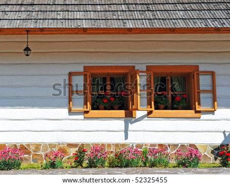 wooden rural slovak cottage front view