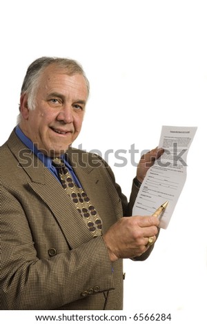 older businessman holding contract for client to sign, isolated on white