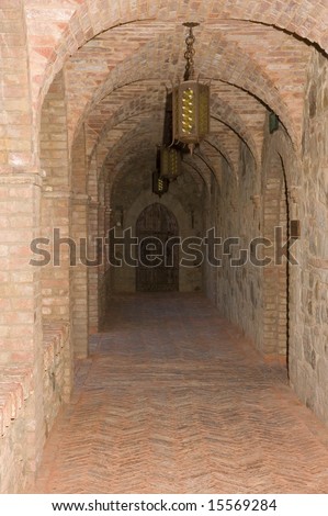 Castle in medieval Tuscan style interior arched corridor
