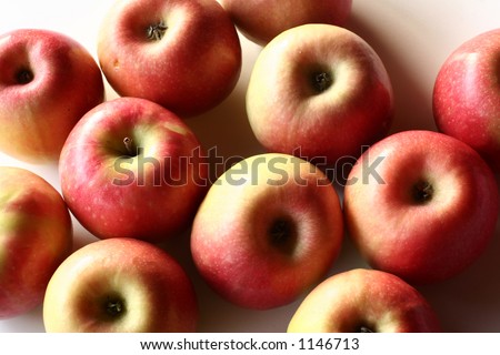 close up picture of apples on white background