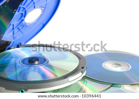 Compact discs and round  blue cd player