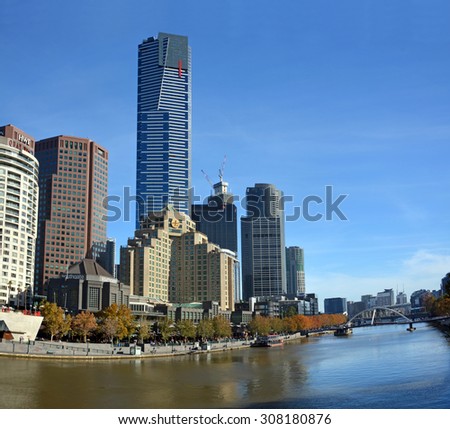 Melbourne, Australia - May 14, 2015: The South Bank of the Yarra River. Popular with locals and tourists for restaurants, bars and cafes. Eureka tower in background.