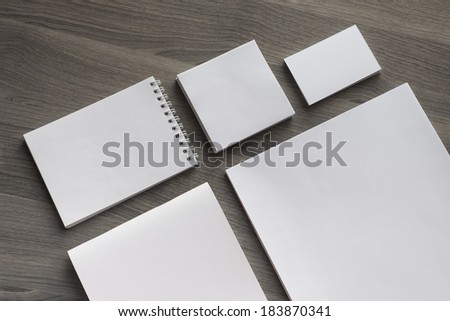 Blank stationery set on wood background / a4 paper, business cards, booklet, etc