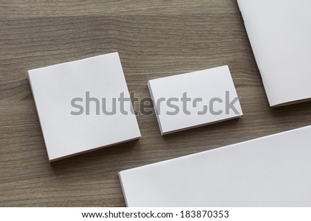 Blank stationery set on wood background / a4 paper, business cards, sheets
