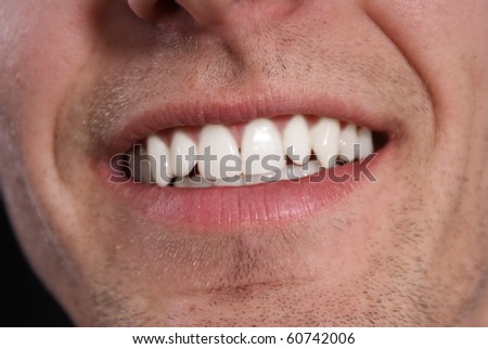 White teeth of young man