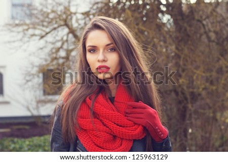 beautiful girl wearing red scarf