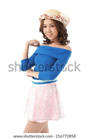 Beautiful young Asian woman posing in off shoulder blue top with white shade of lacework skirt and flower hat isolated on white background.
