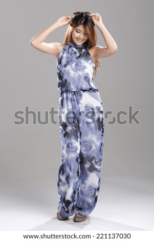 Asian women posing in jumpsuits batik printing, loose casual jumpsuits