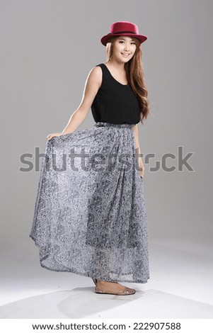 Asian woman posing in Loose Tank Top Sleeveless with Long Pleat Print Skirt