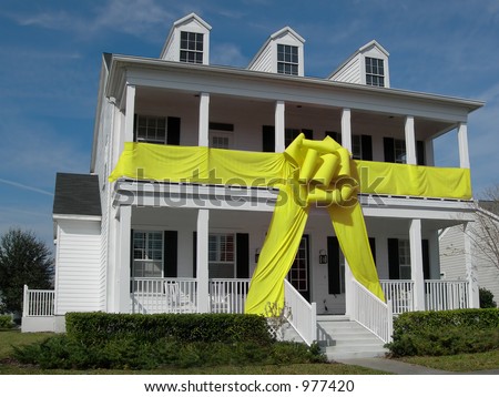 house gift-wrapped for any occasion with giant yellow bow