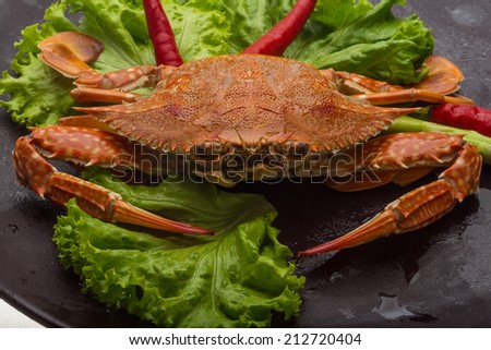 Boiled crab with pepper and salad