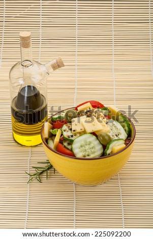 Greek salad with olive oil and vinegar