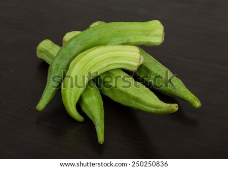 Asian vegetable - okra on the wood background