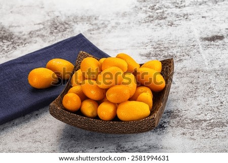 Similar – Image, Stock Photo Heap of kumquats on cutting board