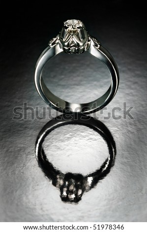 solitaire diamond ring in platinum textured background gradients with reflection