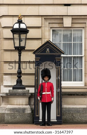 LONDON - JUNE 06: A Royal Guard at Buckingham Palace  on 06 June 2009 in London, England.