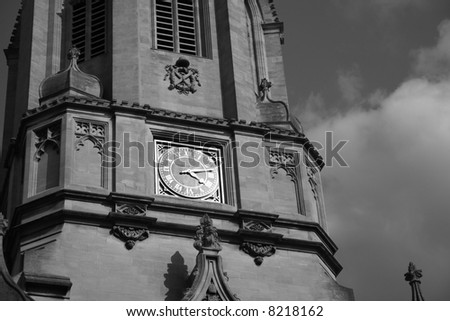 Monochrome image of tower of Christ Church, Oxford, UK, named after the bell \