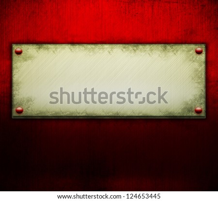 gold plate or plaque on red background