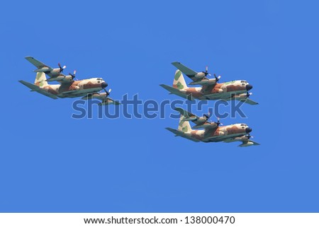 TEL-AVIV, ISRAEL - APRIL 16: Armed bombers flying on festive parade of Israel army of defense during Independence Day celebration on April 16, 2013 in Tel-Aviv, Israel