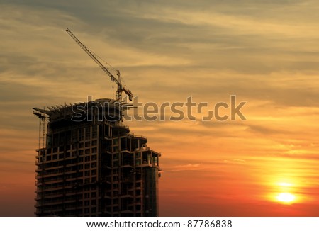Construction work site on the sunset background