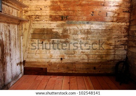 An inside room of a wooden barn