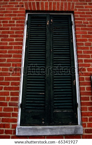 Shuttered window of the Edgar Allan Poe House and Museum in Baltimore, MD