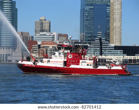 NEW YORK - AUGUST 12: The New York City Fire Department Boat 343 practices maneuvers on August 12, 2011 in the Hudson River off New York City.  The boat went into service on September 11, 2010.