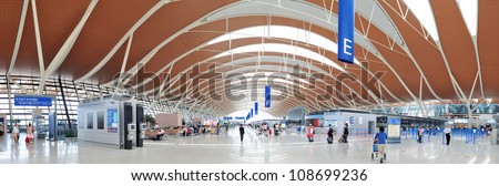 SHANGHAI, CHINA - MAY 27: Pudong Airport interior on May 27, 2012 in Shanghai, China. Pudong airport is the busiest international hub of mainland China, third busiest by cargo traffic in the world.