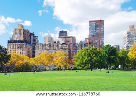 New York City Manhattan Central Park panorama in Autumn with colorful trees and skyscrapers.