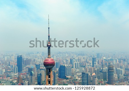 SHANGHAI, CHINA - MAY 28: Oriental Pearl Tower over river on May 28, 2012 in Shanghai, China. The tower was the tallest structure in China excluding Taiwan from 1994-2007 and the landmark of Shanghai.