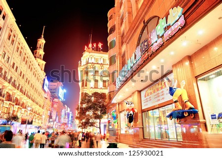 SHANGHAI, CHINA - MAY 28: Nanjing Road street night view on May 28, 2012 in Shanghai, China. Nanjing Road is 6km long as the world's longest shopping district with 1M visitors daily.