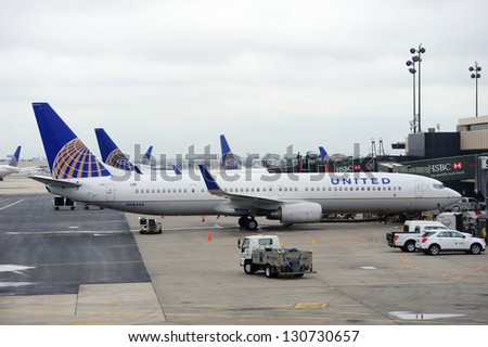 NEWARK, NJ - Oct 5: United Airlines plane at airport on October 5, 2011 in Newark, New Jersey. United Airlines merged with Continental in 2010 as now the world\'s largest airline.