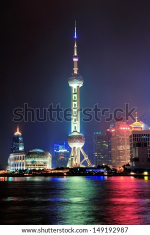 SHANGHAI, CHINA - MAY 27: Oriental Pearl Tower over river on May 27, 2012 in Shanghai, China. The tower was the tallest structure in China excluding Taiwan from 1994-2007 and the landmark of Shanghai.