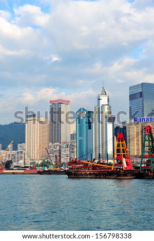 HONG KONG, CHINA - APR 22: Crowded skyscrapers over sea on April 23, 2012 in Hong Kong, China. With 7M population and land mass of 1104 sq km, it is one of the most dense areas in the world.