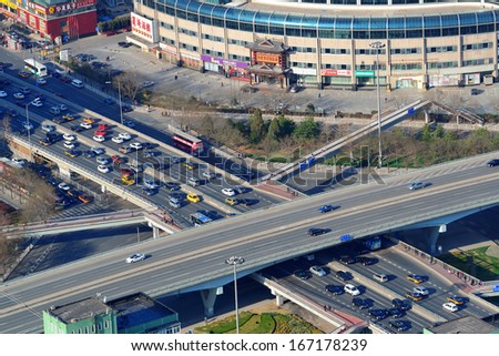 BEIJING, CHINA - APR 1: City aerial view with architecture on April 1, 2013 in Beijing, China. It is the second largest Chinese city and the nation\'s political, cultural, educational center.