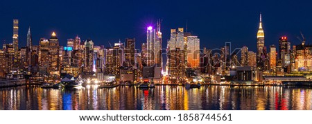 New York City midtown skyline at night with architecture