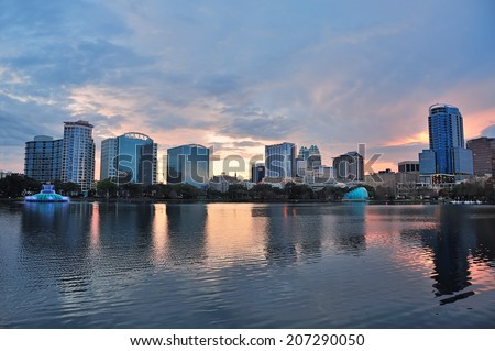 Orlando Lake Eola sunset with urban architecture skyline and colorful cloud