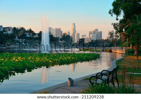 Los Angeles downtown view from park with urban architectures and fountain.