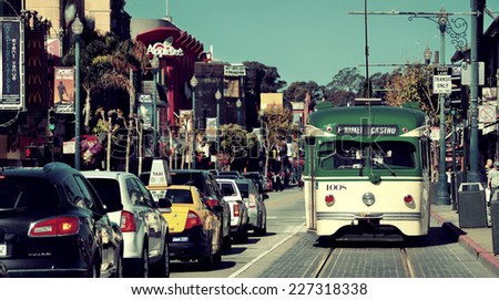 San Francisco, CA - MAY 11: Downtown Street view with traffic on May 11, 2014 in San Francisco. It is the most densely settled large city in California and the second-most in US.