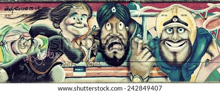 LONDON, UK - SEP 27: street art paintings panorama on wall on September 27, 2013 in London, UK. London is the world\'s most visited city and the capital of UK.