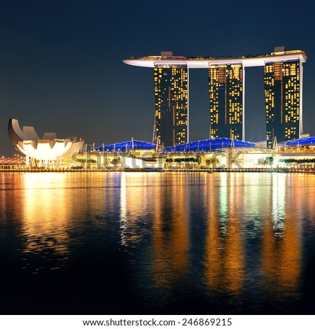 SINGAPORE - APR 5: Marina Bay Sands hotel closeup at night on April 5, 2014 in Singapore. It is the world\'s most expensive building with cost of US$ 4.7 billion and landmark of Singapore.