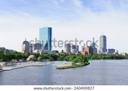 Boston back bay panorama with sailing boat and urban building city skyline in the morning.
