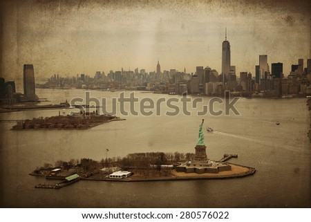 New York City Manhattan aerial view with downtown skyscrapers and statue of liberty