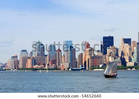 New York City Manhattan skyline with skyscrapers and sailing boat