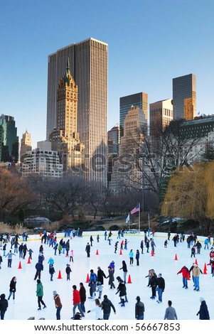 NEW YORK CITY - JAN 1: Ice-skating people with white Christmas in Central Park welcome the new year of 2010 on January 1, 2010 in Manhattan, New York City.