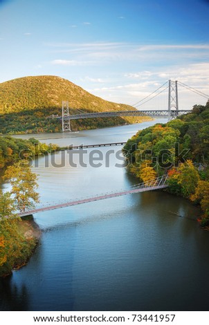 Hudson River valley in Autumn with colorful mountain and Bridge over Hudson River.