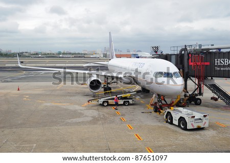 NEWARK, NJ - OCT 5: United Airlines plane at airport on October 5, 2011 in Newark, New Jersey. United Airlines merged with Continental in 2010 as now the world\'s largest airline.