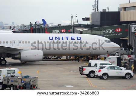 NEWARK, NJ - Oct 5: United Airlines plane at airport on October 5, 2011 in Newark, New Jersey. United Airlines merged with Continental in 2010 as now the world\'s largest airline.