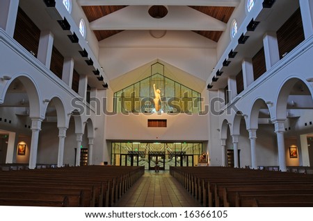Blended exposure on a christian church interior showing the risen Christ